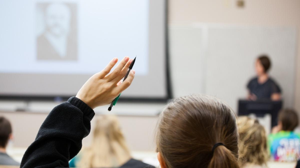 Hand raised in classroom